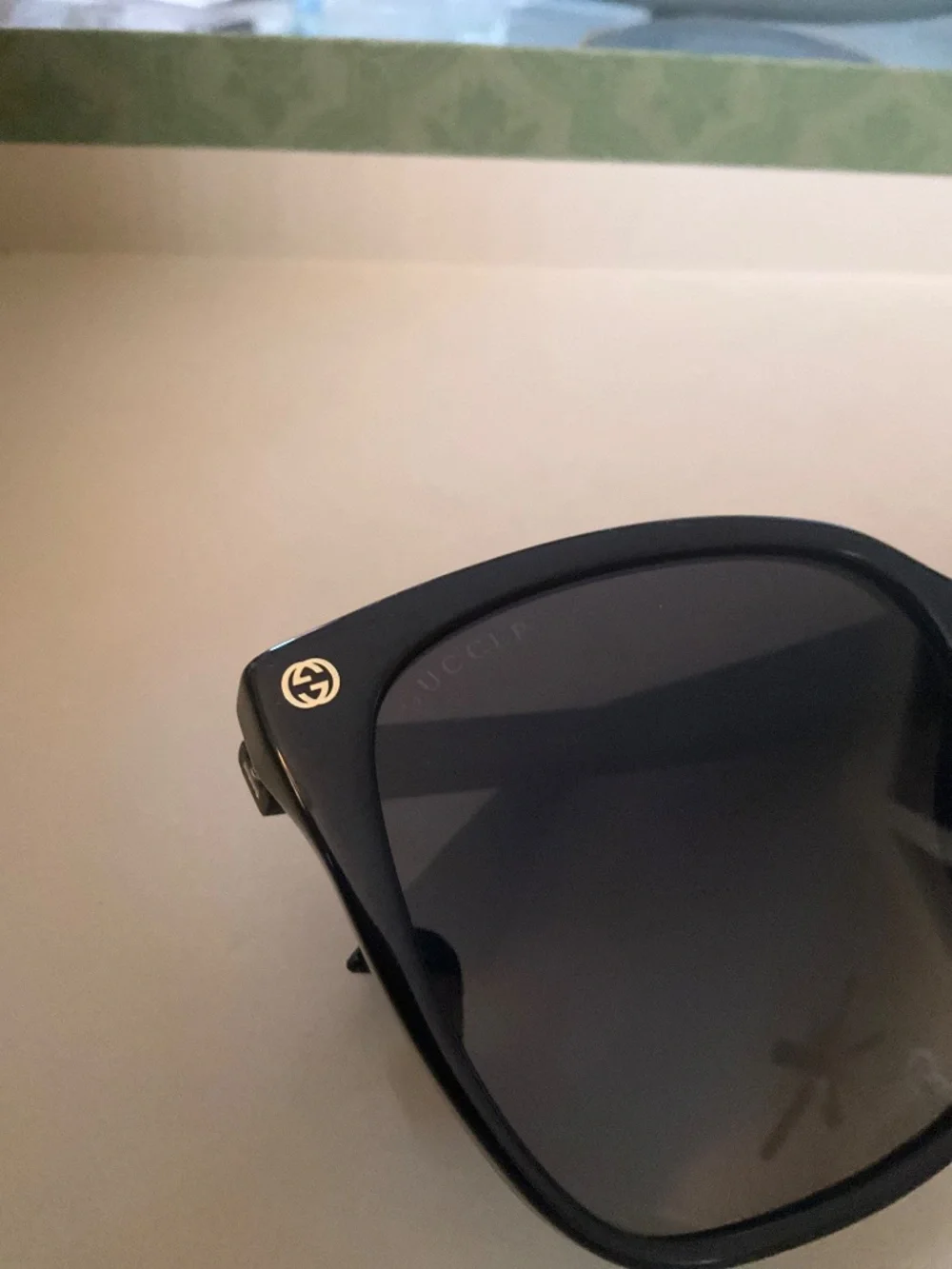 GUCCI GG0022S Women's Cateye Sunglasses Black Gold Logo/Grey Smoke Gradient 57mm